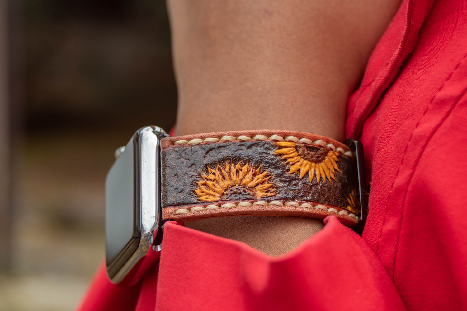 Handmade tooled leather Apple Watch bands with intricate designs, crafted for durability and style. Perfect for a unique, custom Apple Watch upgrade.