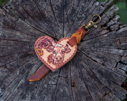 Leather tooled Heart charms , Tooled hearth charm, heart leather key ring, horse tooled heart charm. cow tooled leather key ring, Western Key Lanyard,

Unique Leather Accessories,

tooled leather,

Leather Keychain Gift

Leather key chain

leather carved key chain

horse key chain,

heart charm,

Handmade leather,

Handcrafted Leather Keychain,

gift for her,

Genuine Leather Heart Charm,

car key chain,

,bag tussle

